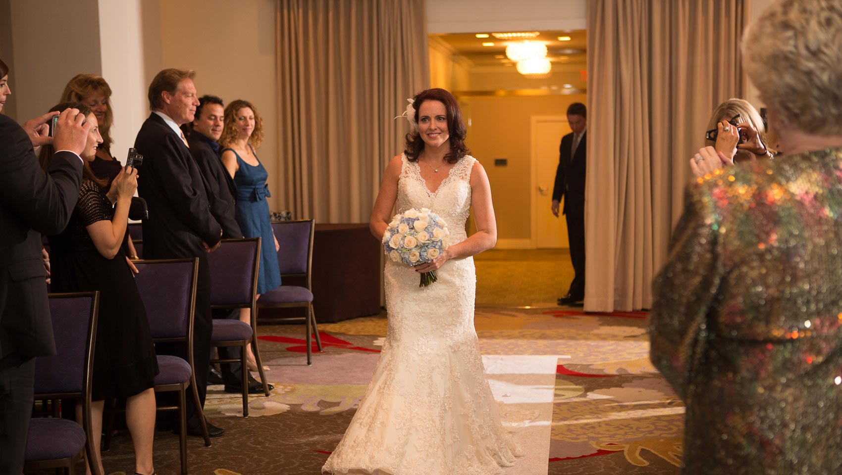 Bride walking down the aisle at Kimpton Hotel Palomar Philadelphia