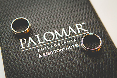 Grooms' rings on a Hotel Palomar mat