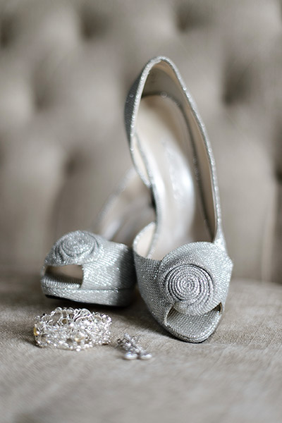 Close up of Bride's shoes and jewelry