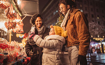 Young family at Christmas market