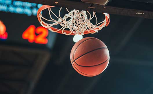 Basketball going in Hoop